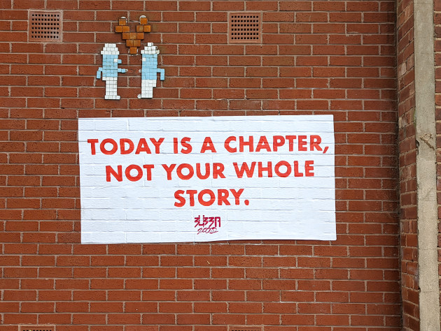 Paste-up with the words 'Today Is A Chapter, Not Your Whole Story'
