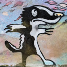 Close-up of a mural of a badger