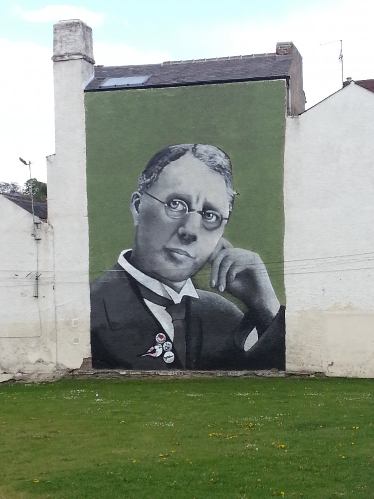 Portrait of Harry Brearley by Faunagraphic painted on an exterior wall