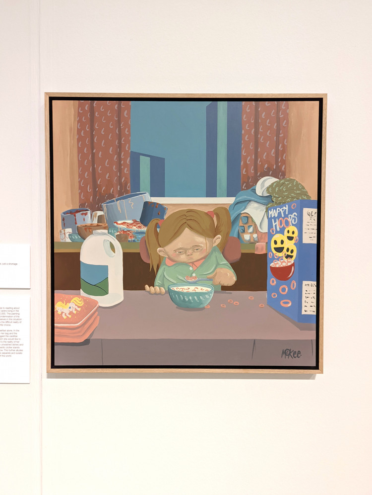 Painting of a young girl eating breakfast alone with dirty pots and piles of unwashed clothes in the background