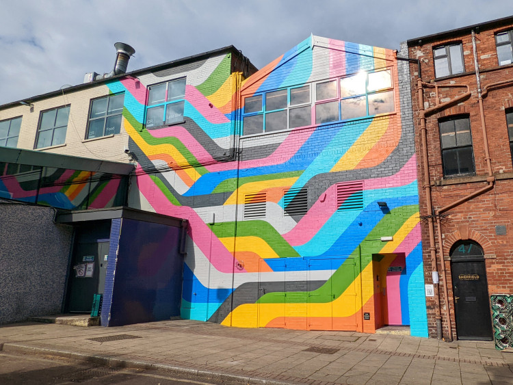 Colourful wall mural on the side of the Forum bar and True North brewery