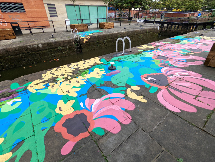 Floor mural by Venessa Scott of water and flowers