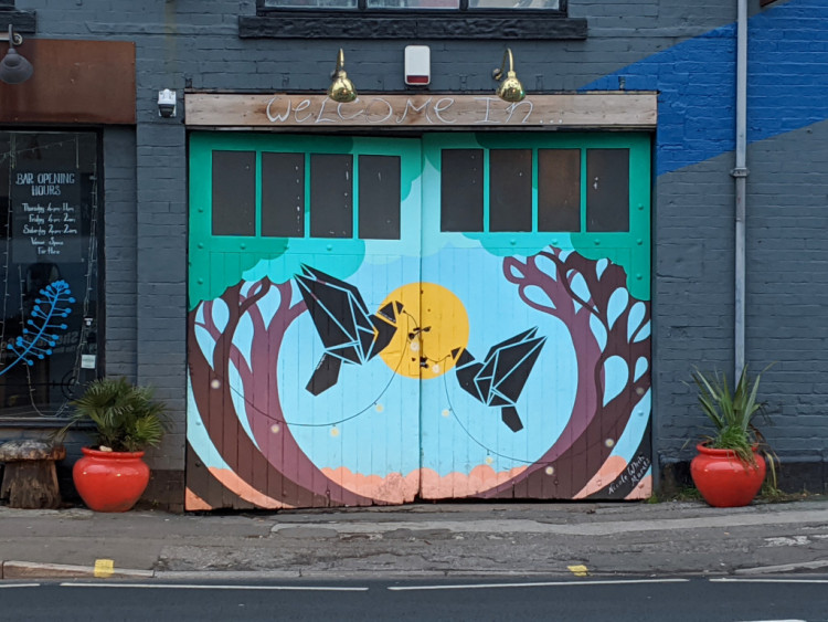 Mural of two origami birds