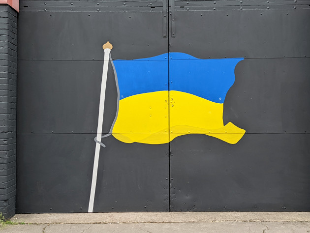 Close up of Ukrainian flag painted onto garage doors