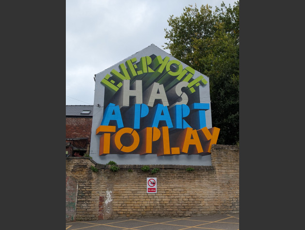 Mural saying everyone has a part to play in a three dimensional style