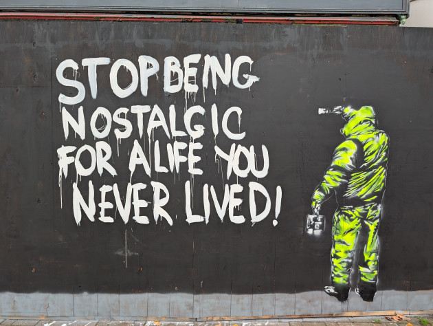 Mural with the words Stop being nostalgic for a life you never lived