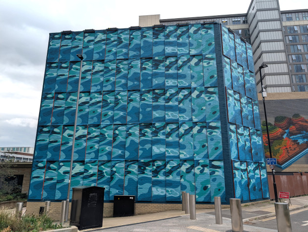 Large wall mural representing flowing water