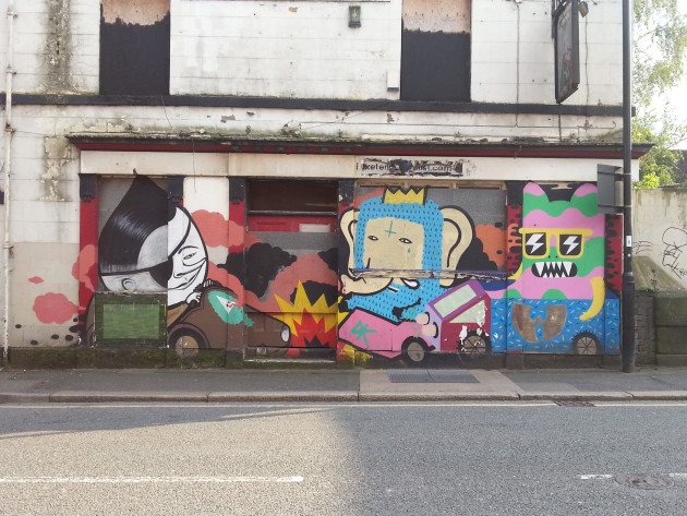 Collaborative mural by Ema, Kid Acne and Malarky featuring three distinctive characters