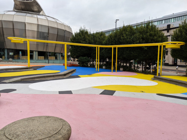 Abstract mural on the ground of the Pinball Park