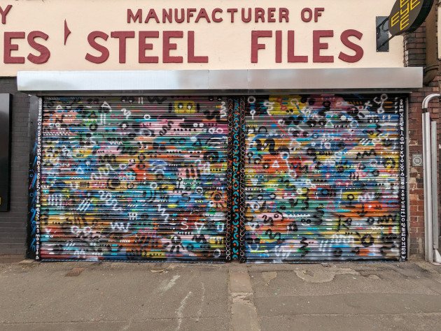 Shutters sprayed with abstract style artwork