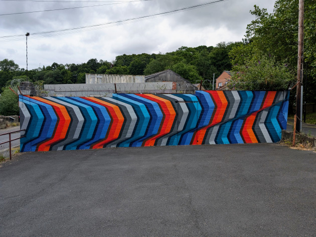 Flat wall mural with a three-dimensional illusion