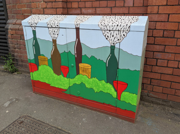 Red Don painted street cabinet