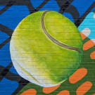 Mural close up showing the detail on a padel ball.