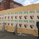 Boardings covered in Robin Loxley's Putin posters